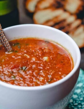 Roasted Tomato Basil Soup served in cups with grilled bread slices
