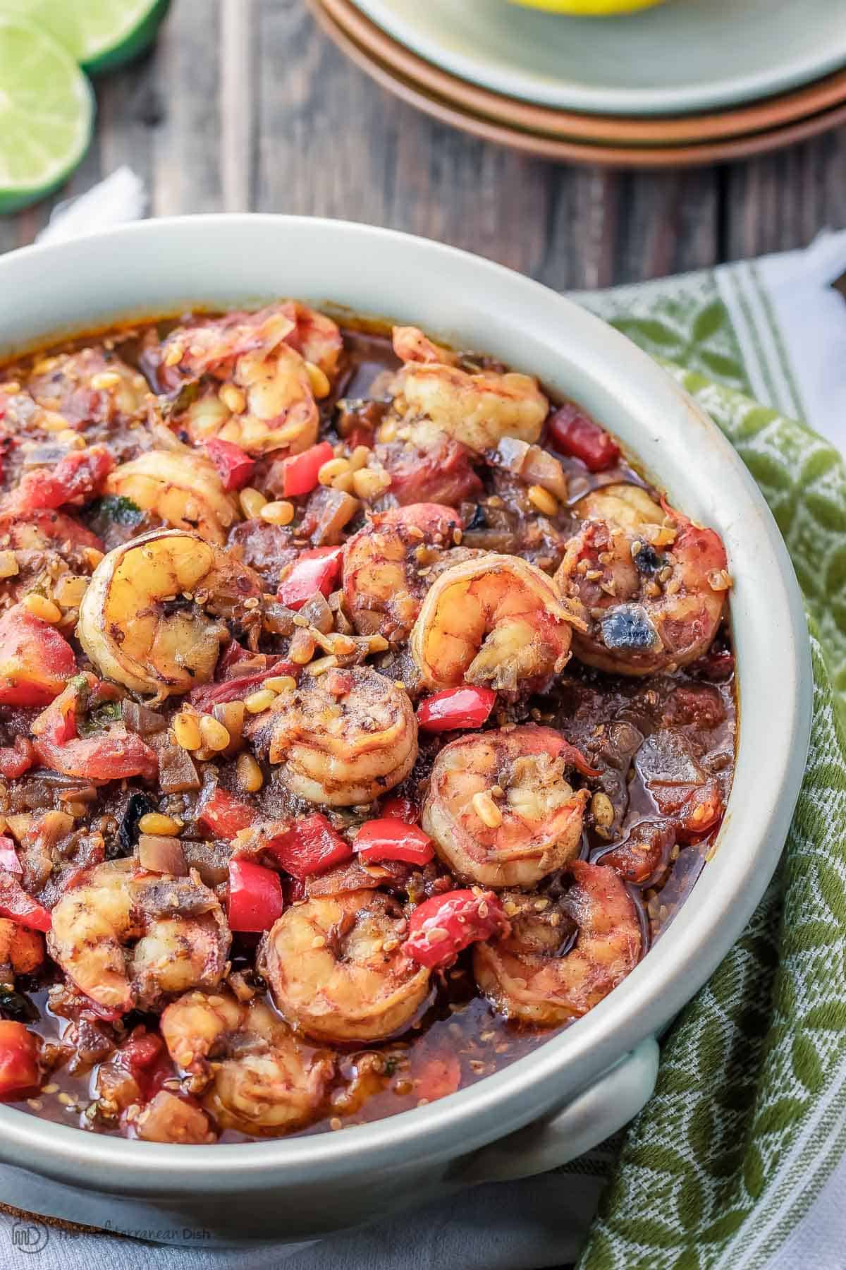 Shrimp stew served in bowl on a table setting