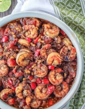 Shrimp stew served in bowl on a table setting