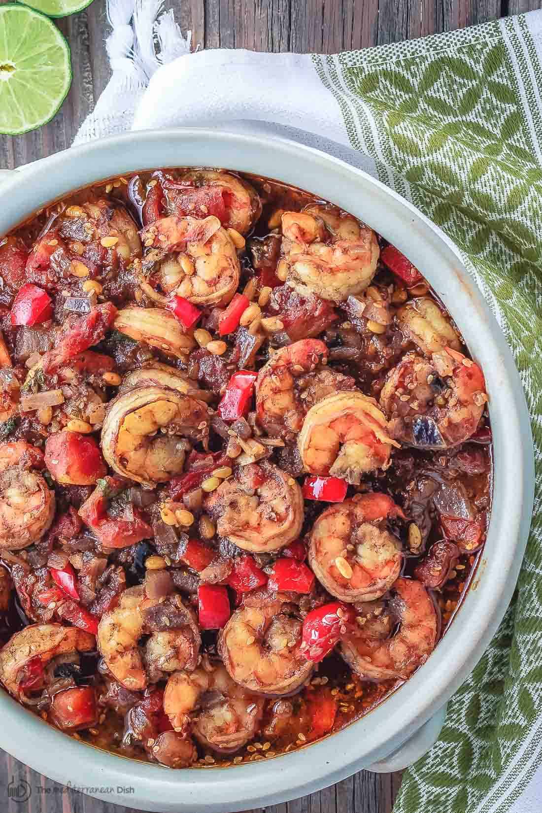 Shrimp stew served in bowl on a table setting