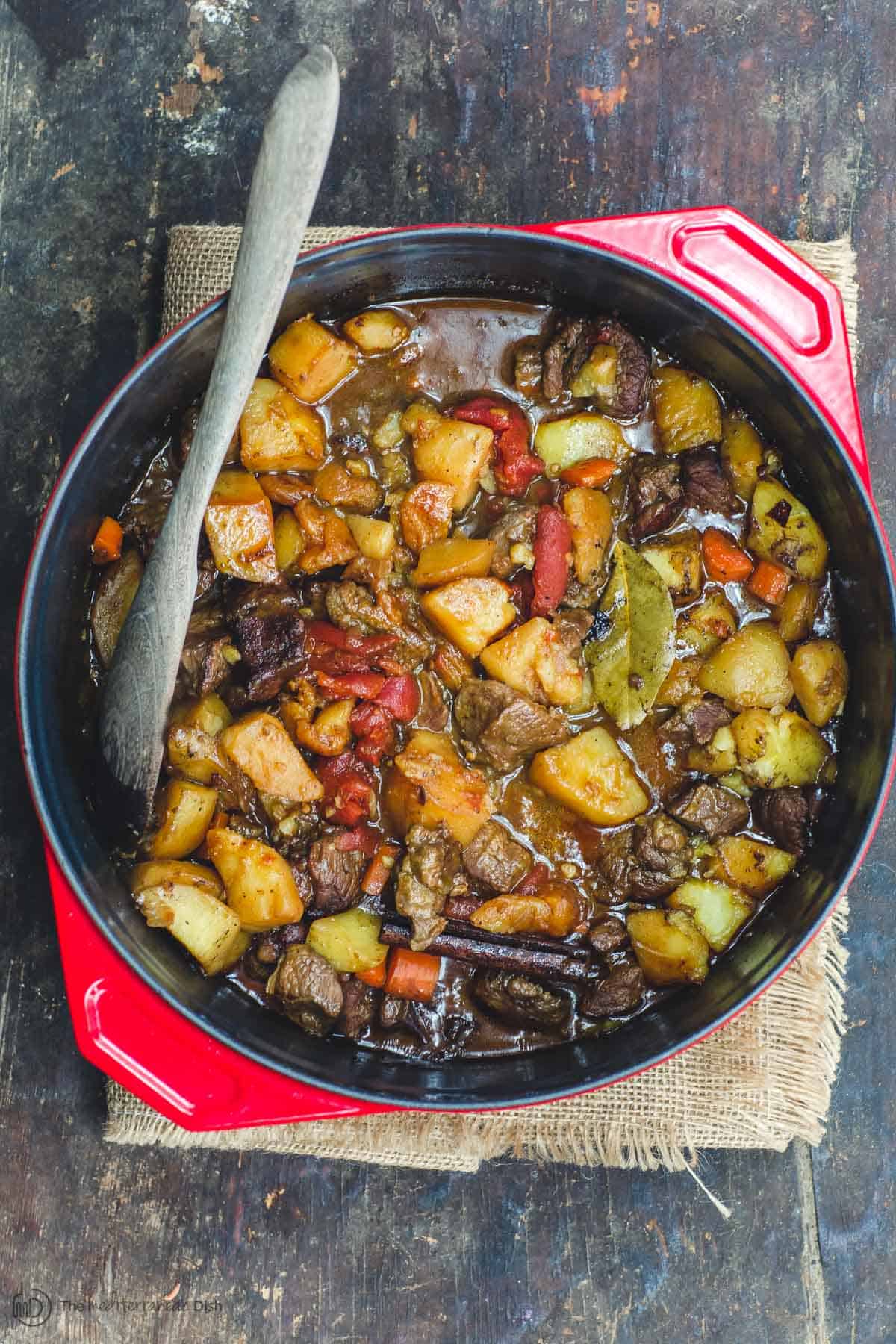 Lamb stew in pot, a ladle ready for serving