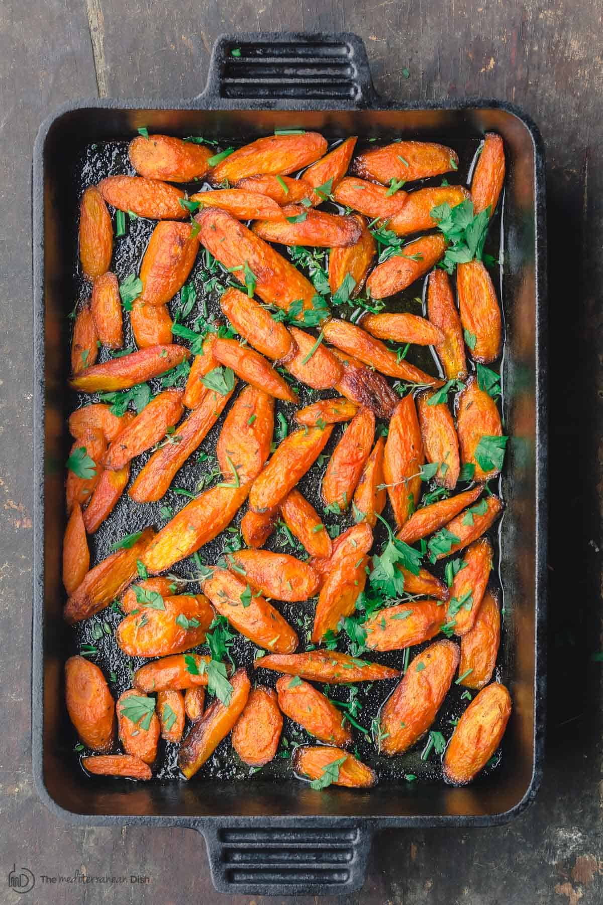 Roasted carrots in large baking pan