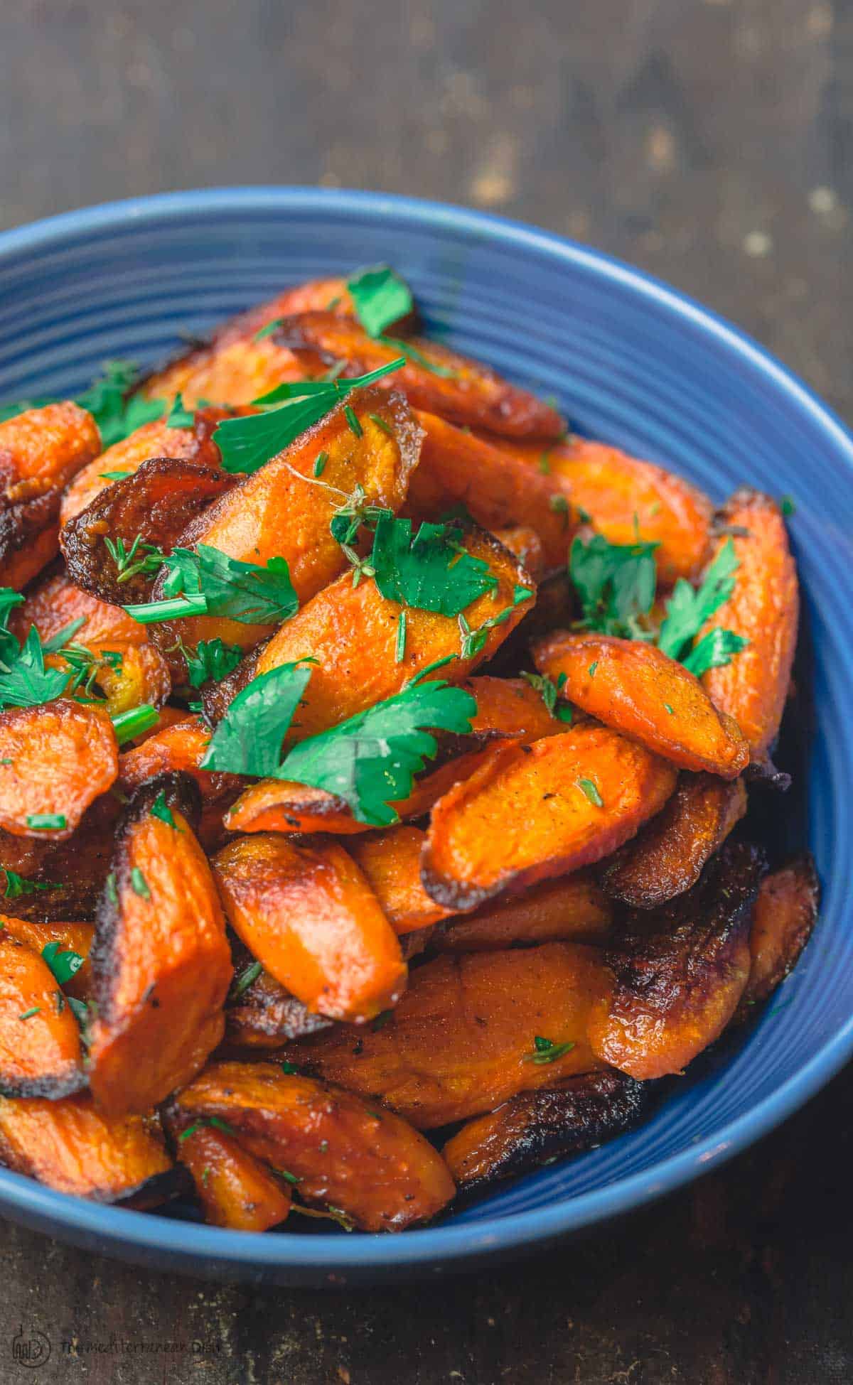 Roasted carrots in bowl with parsley