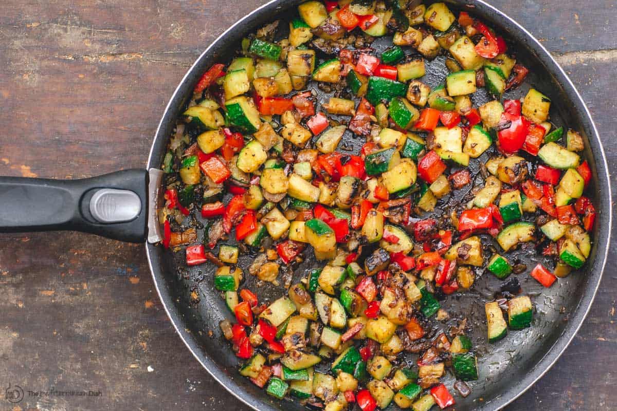 Vegetable filling of zucchini, bell pepper, and onions for vegetarian baked ziti 