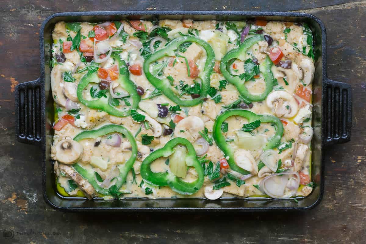 Ingredients for egg casserole in baking pan