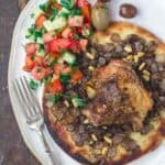 Musakhan sumac chicken assembled and served with salad