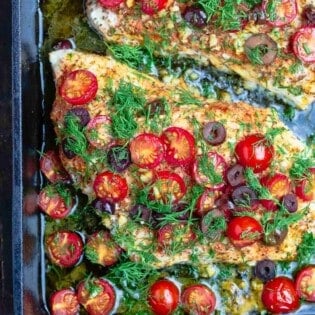 Mediterranean style baked grouper recipe with tomatoes and olives