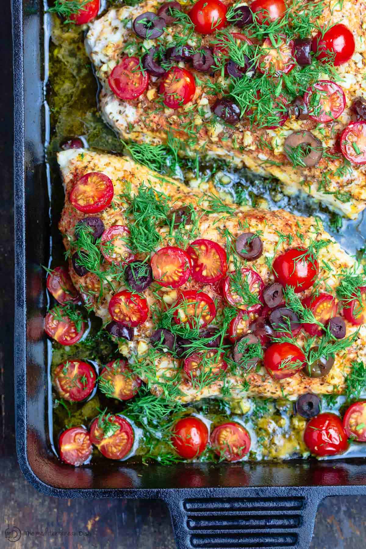 Mediterranean style baked grouper recipe with tomatoes and olives