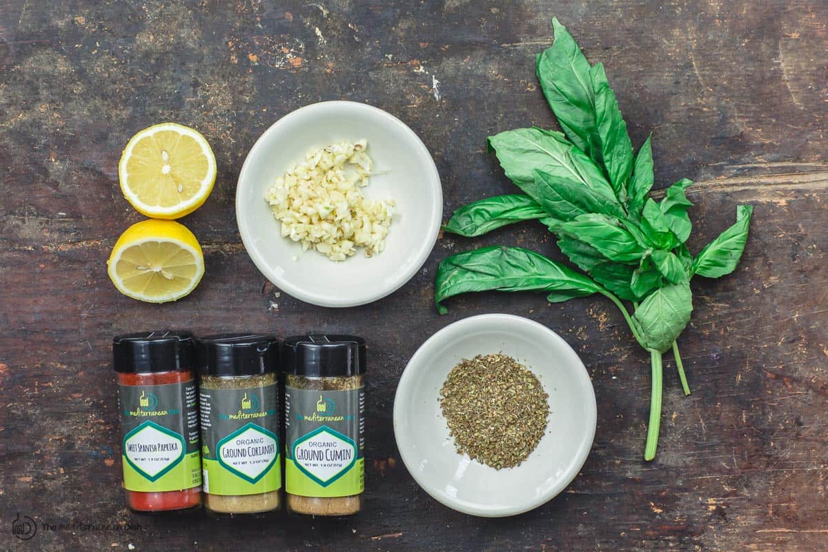 Garlic, spices, fresh basil, and lemon juice for sauteed shrimp recipe