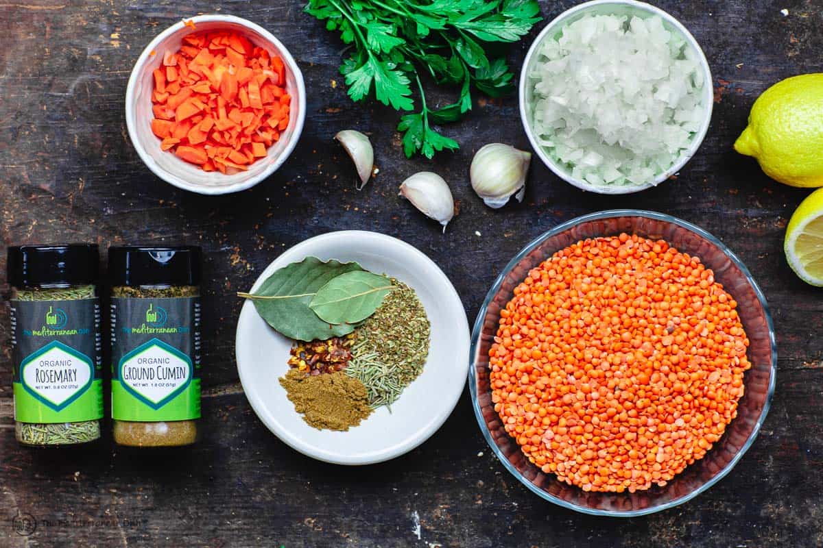 Ingredients for red lentil soup. red lentils, onions, garlic, carrots, parsley, spices, lemon etc. 