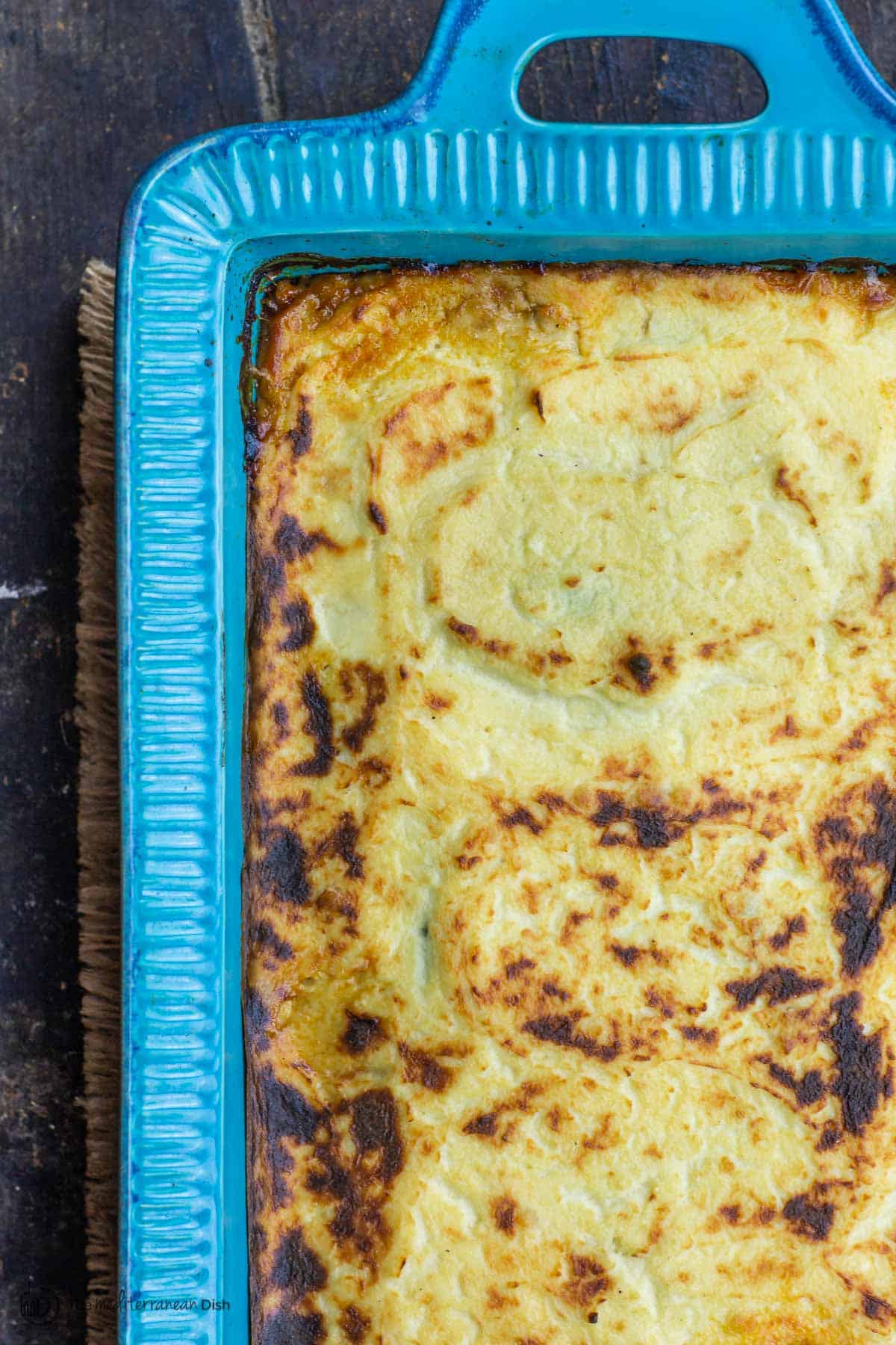 Vegetable moussaka after baking. Golden brown bechamel layer