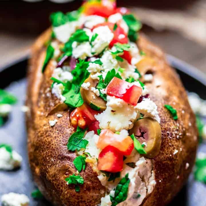 Loaded baked potato with Mediterranean toppings