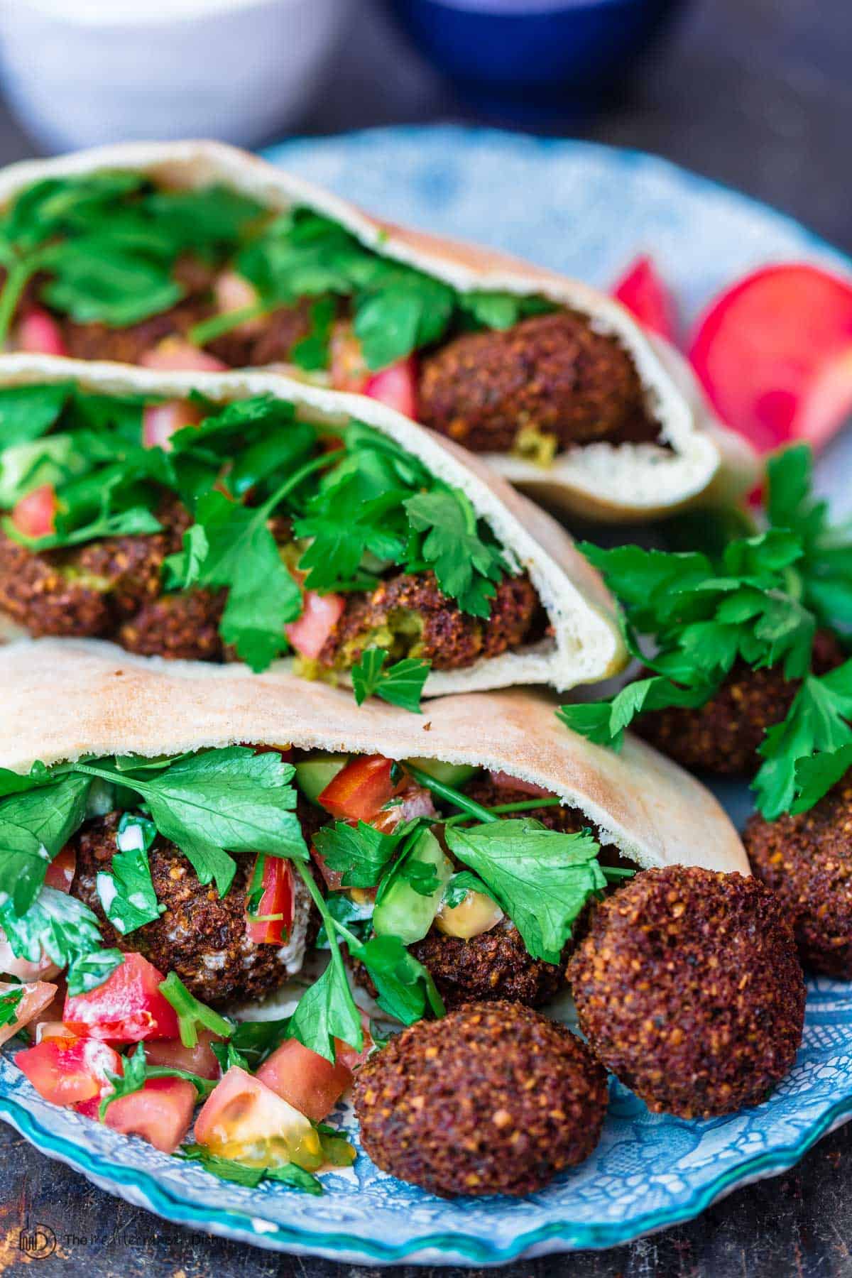 Falafel in pita pockets with garden vegetabiles and tahini