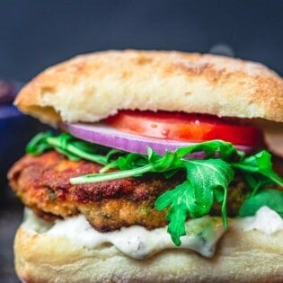 juicy salmon burger in ciabatta bun