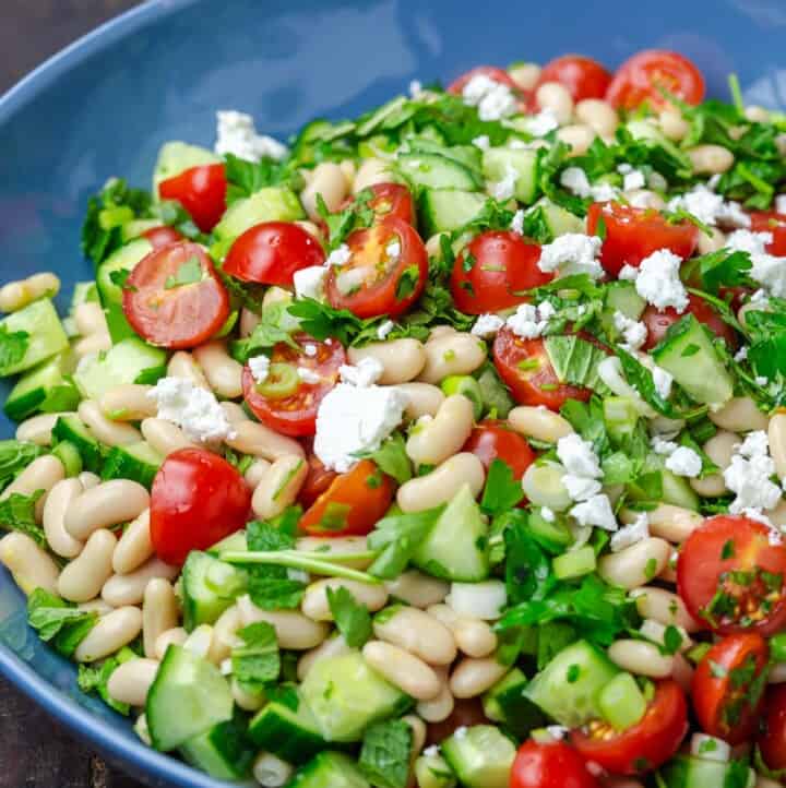 White Bean Salad with chopped vegetables and fresh herbs