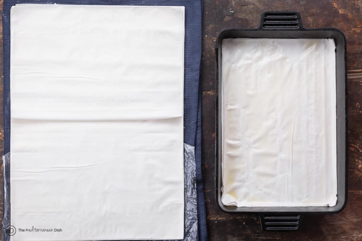 First few sheets of phyllo dough assembled in the baking dish