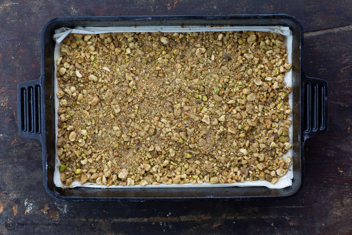 A bit of the nut mixture distributed over phyllo