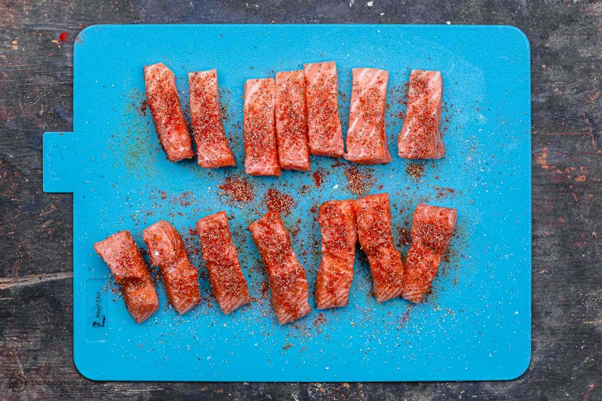 Seasoned raw salmon fish sticks