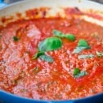 Homemade spaghetti sauce topped with basil