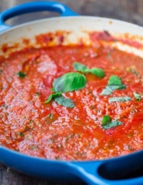 Homemade spaghetti sauce topped with basil