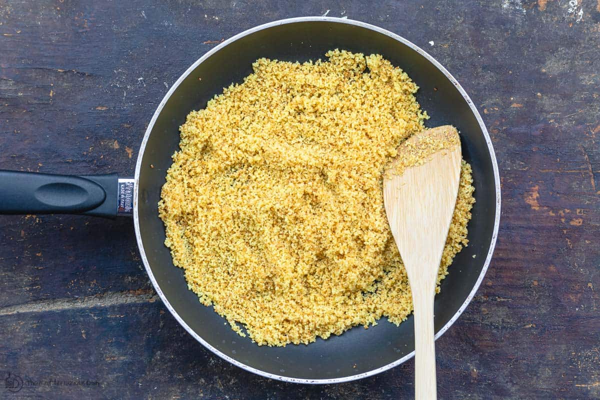 Toasted couscous in skillet