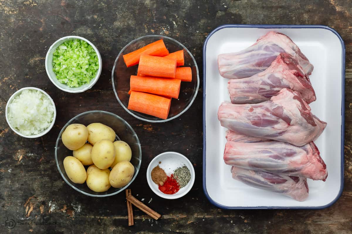 ingredients for lamb shank recipe. Lamb shanks, potatoes, carrots, celery, onions and spices 