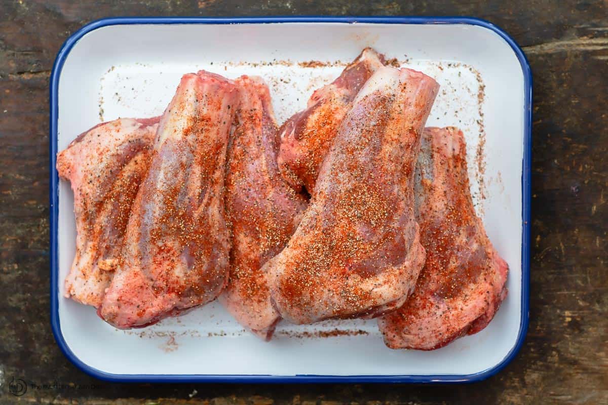 Lamb shanks seasoned before cooking