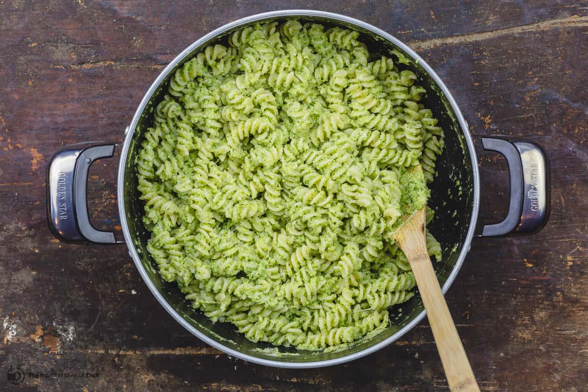 Pasta is combined with the broccoli pesto in the pot off heat