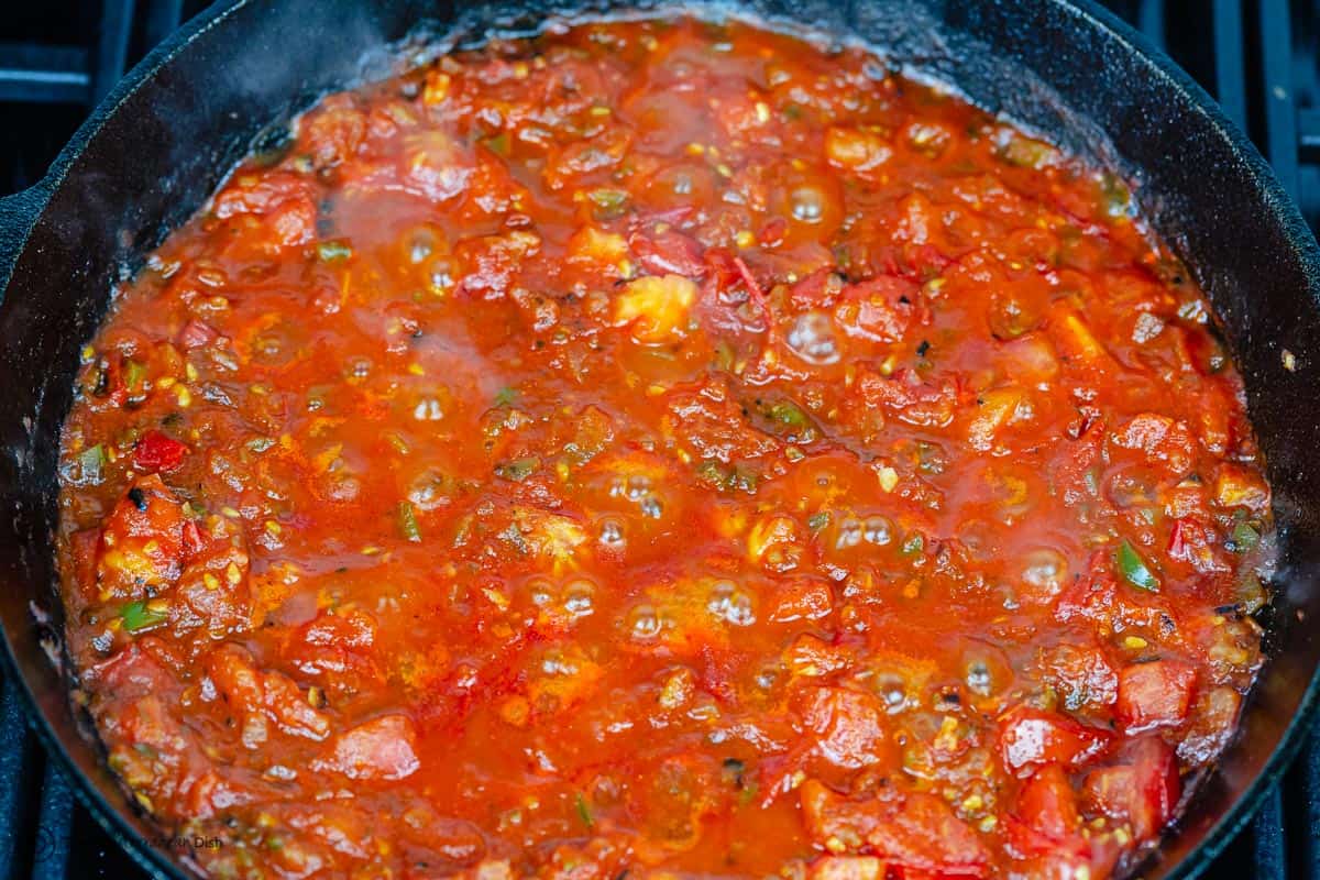 cooked tomatoes, bell peppers, onions and garlic