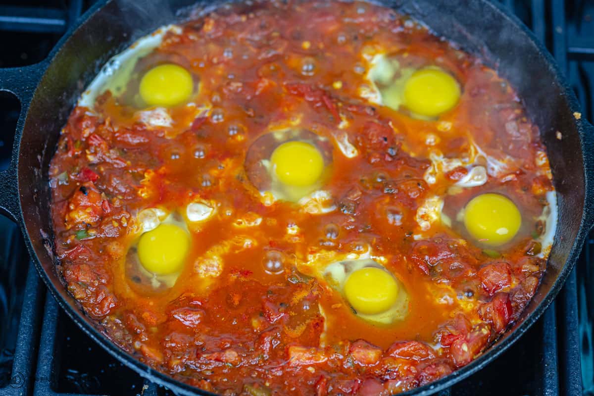 eggs added to the tomato mixtures