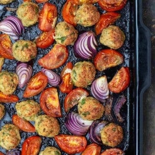 baked chicken meatballs with tomatoes and onions