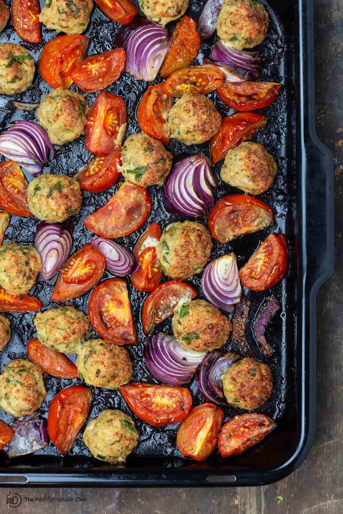 baked chicken meatballs with tomatoes and onions