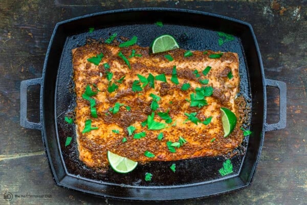 fully cooked honey mustard salmon with lime juice and parsley on top