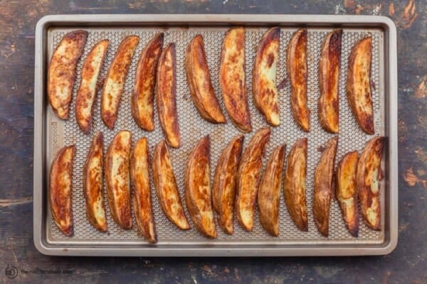 crispy potato wedges out of the oven