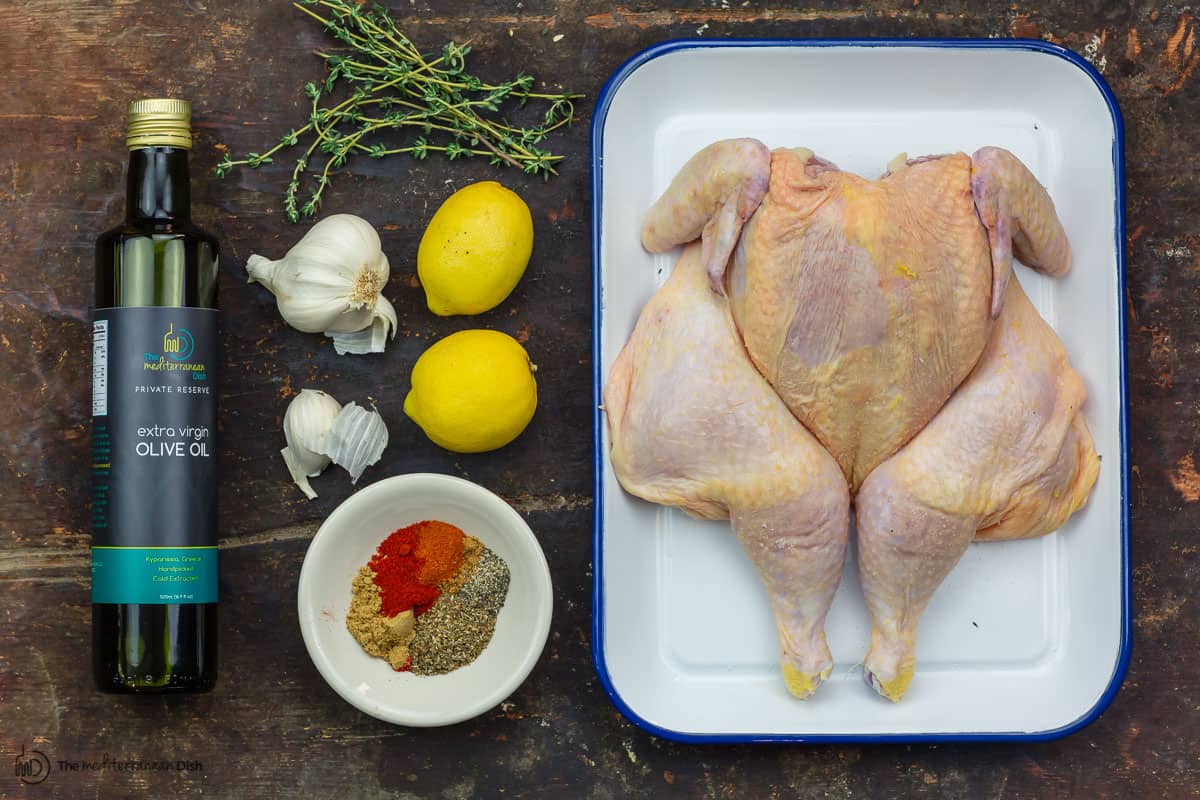 Chicken seasoned with salt. marinade ingredients to the side