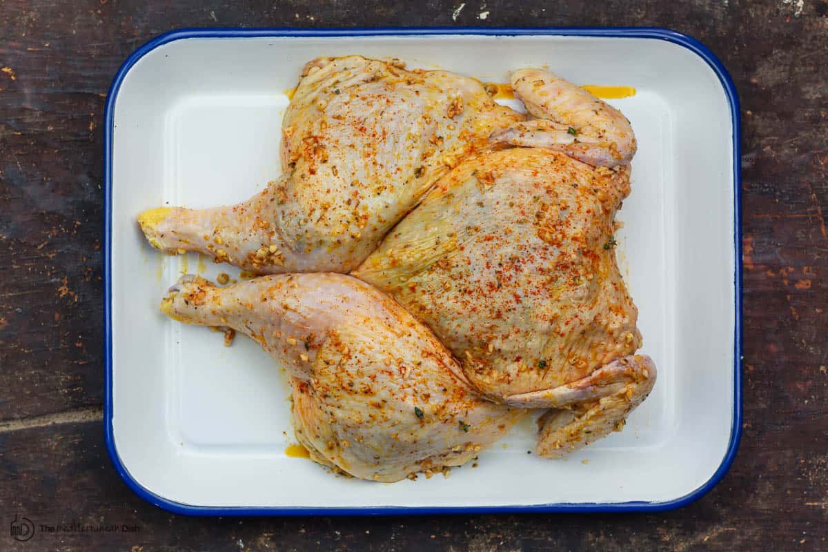 Whole chicken with the marinade applied