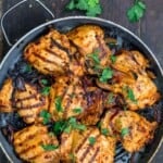 harissa chicken in the pan. a side of parsley