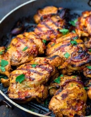 grilled harissa chicken in a pan