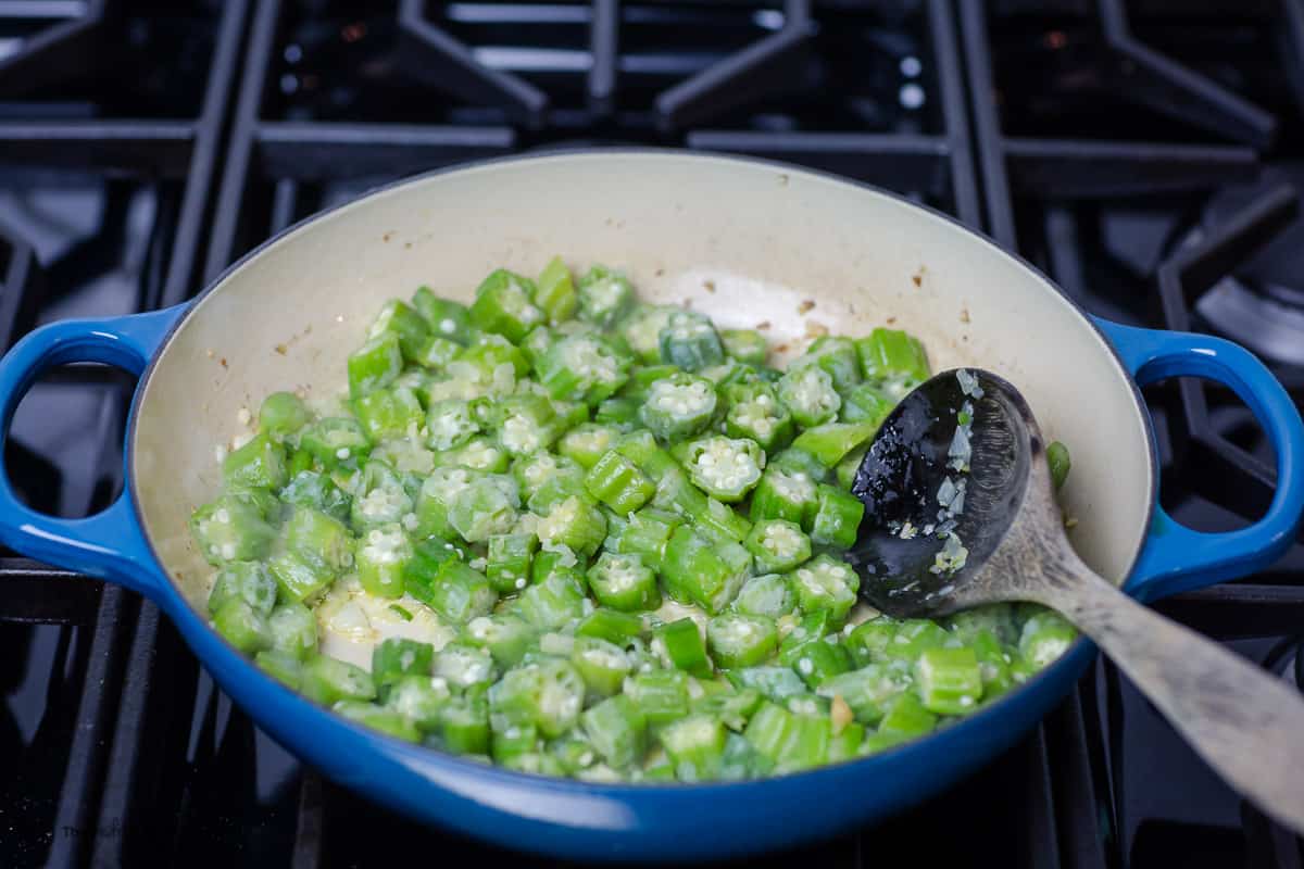 Okra is added to saute with onions, garlic and jalapeno