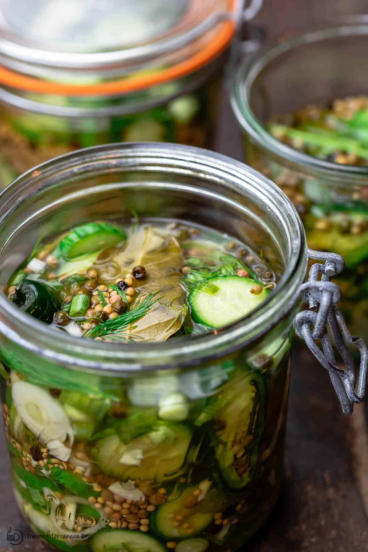 cucumber pickles in wide mouth jar ready for refrigeration