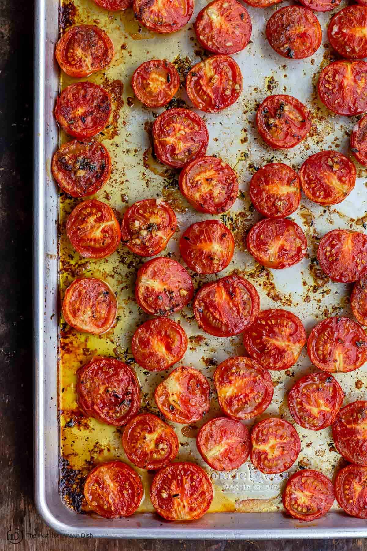 Oven roasted tomatoes on pan