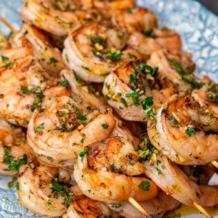 Shrimp kabobs on platter