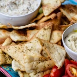 homemade pita chips served with hummus, baba ganoush and fresh vegetables