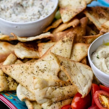 homemade pita chips served with hummus, baba ganoush and fresh vegetables