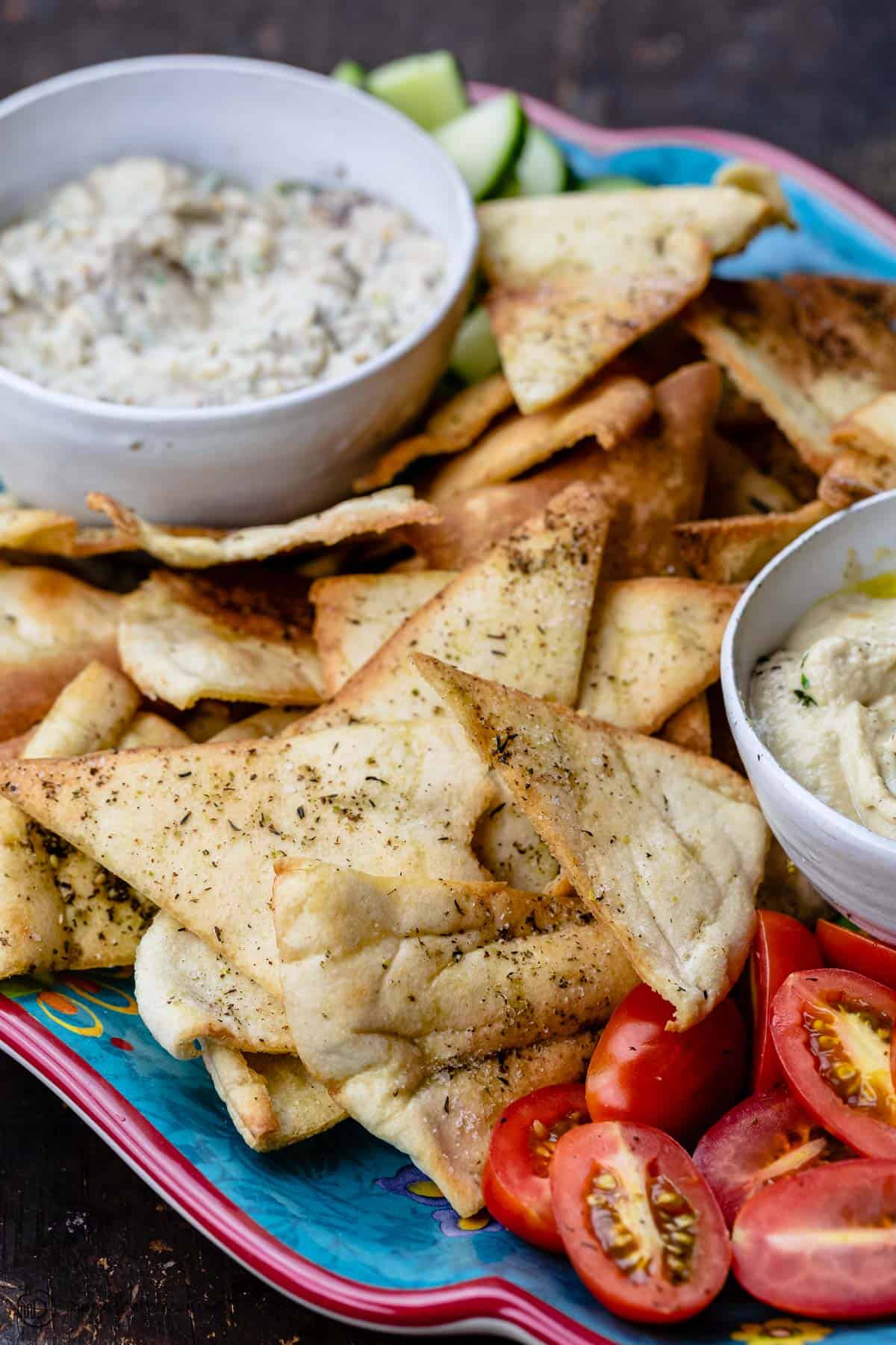 homemade pita chips served with hummus, baba ganoush and fresh vegetables