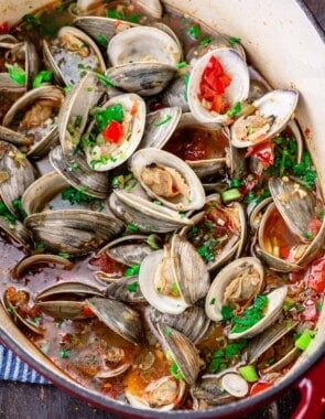 Mediterranean steamed clams in a large pot