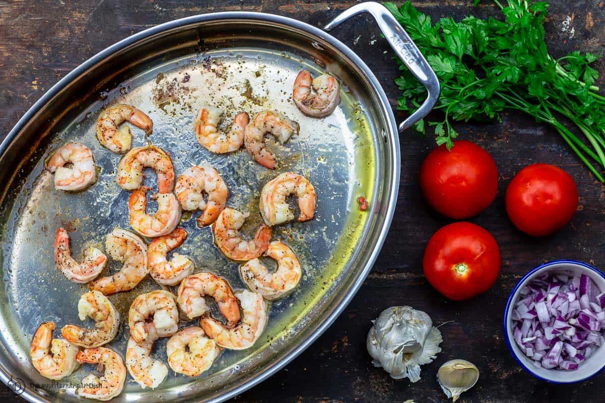 Shrimp cooked first in pan. Other ingredients to the side