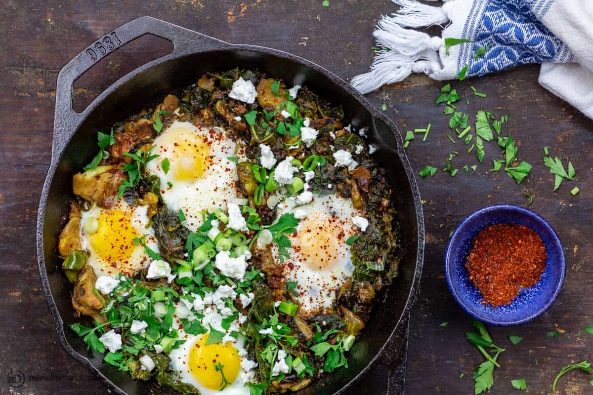 green shakshuka with a side of Aleppo chile flakes