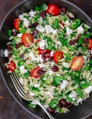 Mediterranean orzo salad in a large bowl