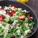 Greek orzo salad with a side of lemons